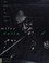 Go to record Miles Davis : the man in the green shirt
